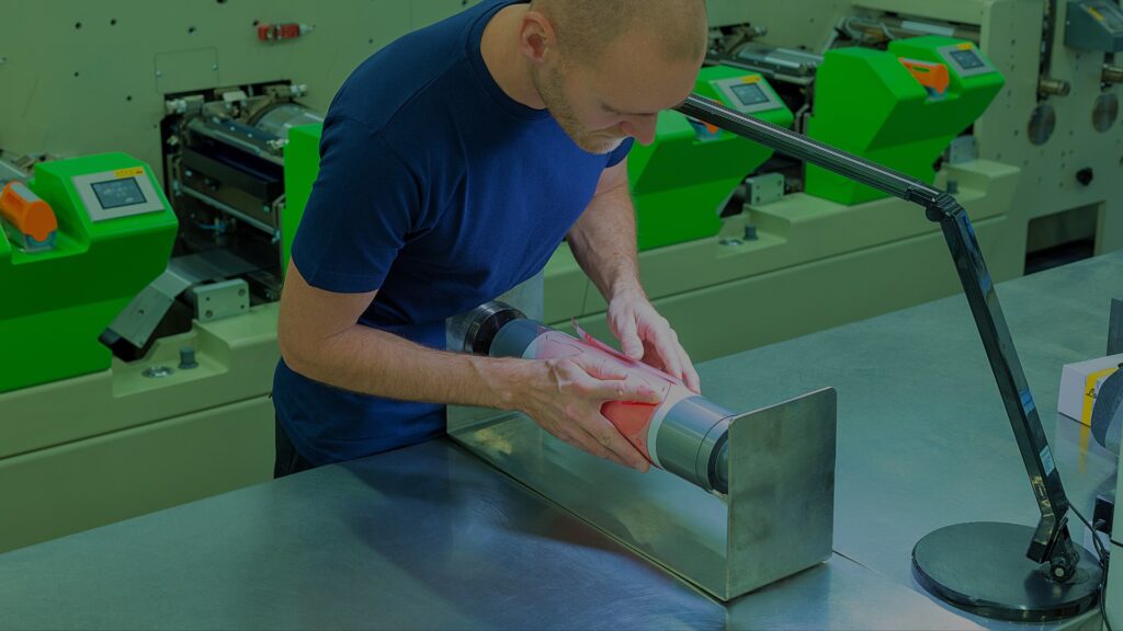 man using Flexographic Printing Machine